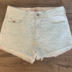 Hollister Light Wash Frayed Hem Shorts With A White Crochet Lace Over Lay