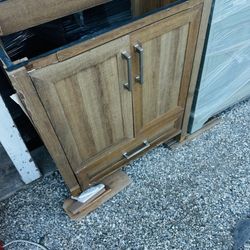 30’ vanity cabinet get Brocken lag still working good you can fixe it need TLC  retail $350 we ask.$75   Also I have countertop $100 please be serius 