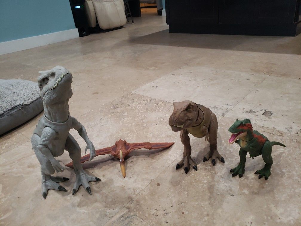 Jurastic World Toy Set Idominos Rex ,taradactal,Rapter, T Rex.