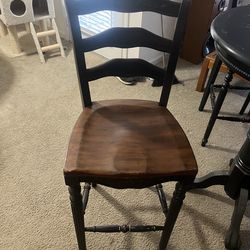 Antique table with three chairs