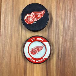 2 Detroit Red Wings Hockey Pucks