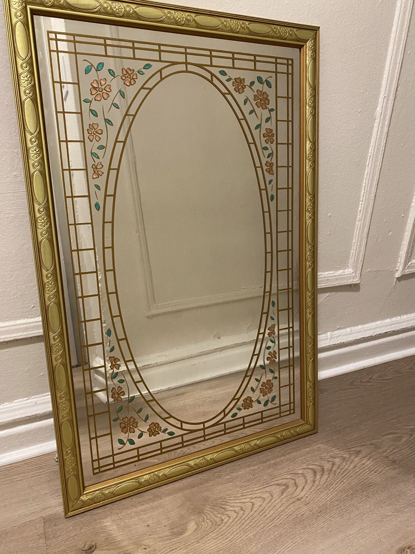 Gold Colored Mirror With Floral Design