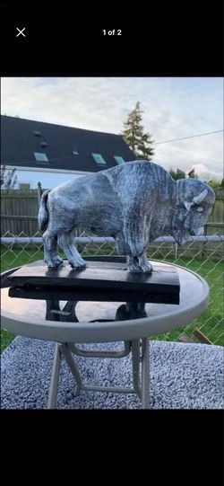 The old gray buffalo statue
