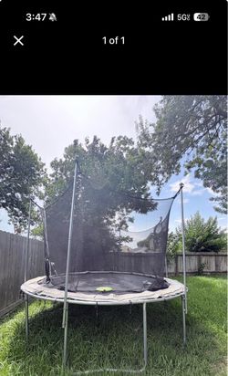 Large trampoline with net