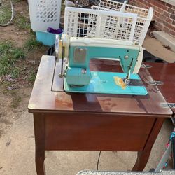 An Antique, Precision Sewing Machine, In Good Conditions, Come With Its Table (NO SHIPPING)
