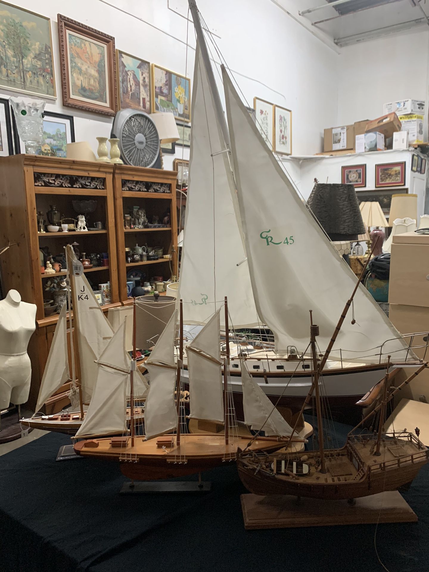 Collection of four model sailboats