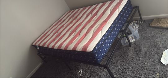 Twin sized bed frame and mattress