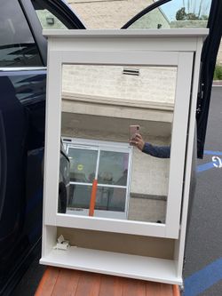 Brand new mirror w/storage