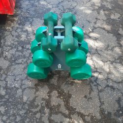 Set Hand Weights,  2 Small #5 Pounds  2 Bigger #5 Pounds,  2  #8 Pounds And Rack For All Weights, Very Good Condition 