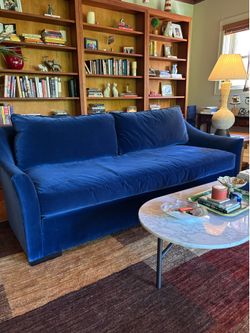 Great condition down filled blue velvet sofa