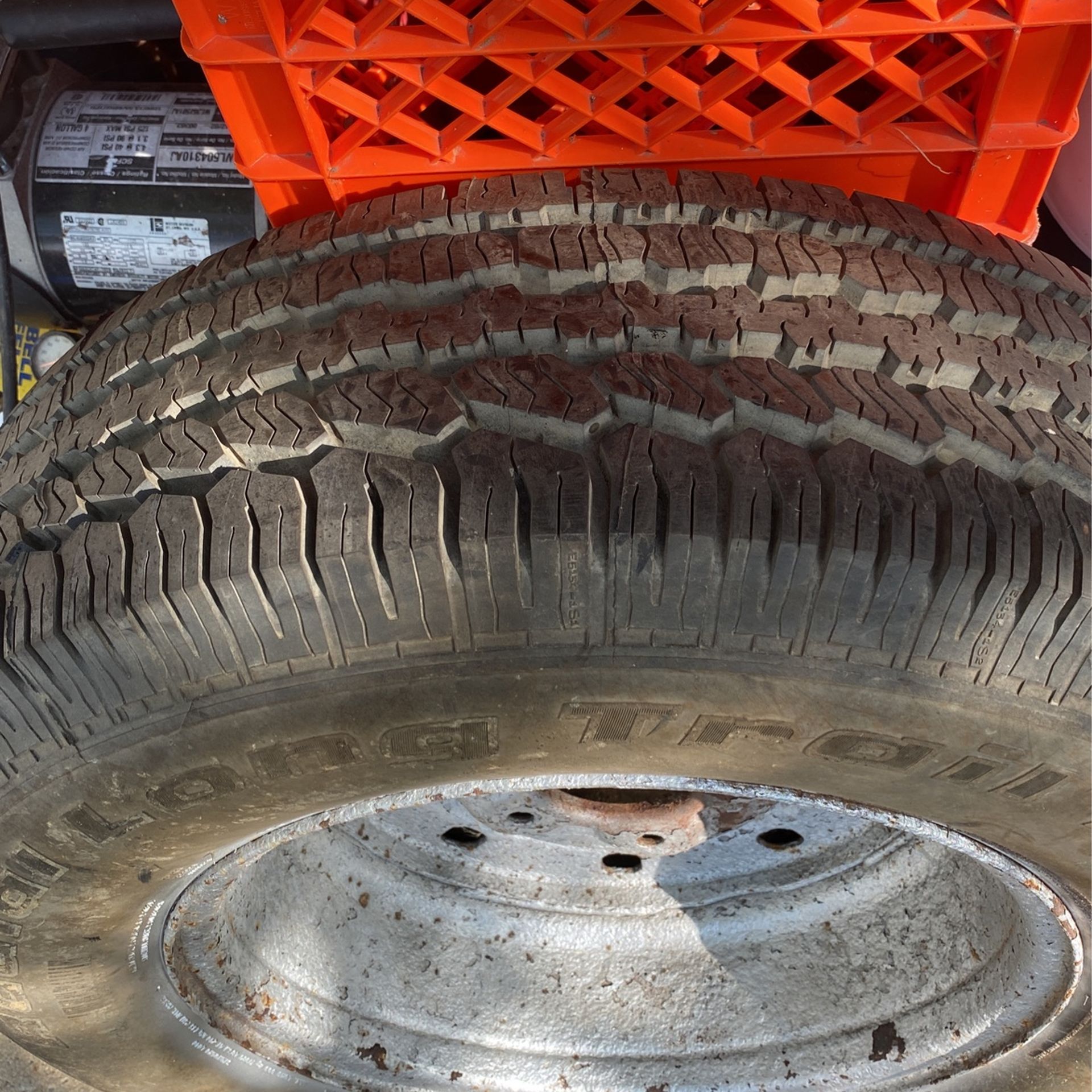 F 150 spare tire and steel rim.