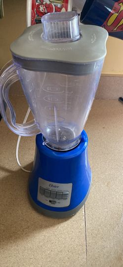 Oster blender. Blue base. Works