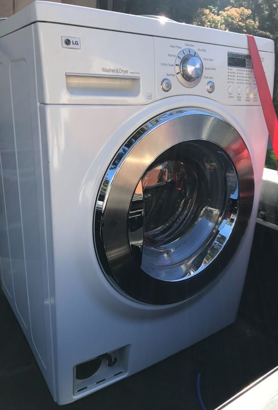Lightly used LG wm1388hw stackable load washer & dryer 2 in 1