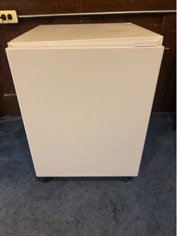 Heavy-Duty Metal Storage Cabinet on Wheels – $50