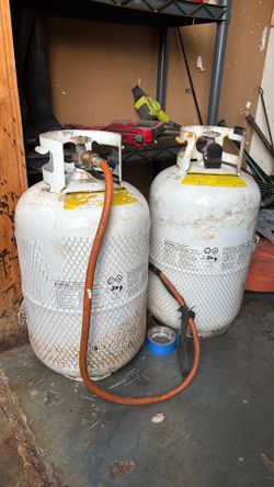Two big propane tanks 75$ each both full