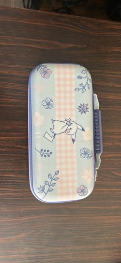 Pikachu Nintendo Switch Carrying Case with nintendo switch and both joy cons
