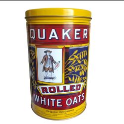 This is a vintage 1980s Quaker Rolled White Oats limited edition tin canister