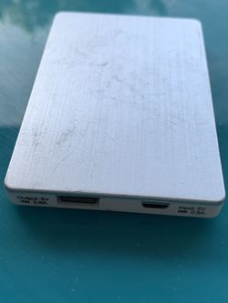 Portable cell phone charger