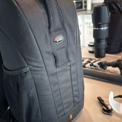 Camera Lens and Backpack 