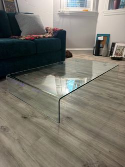Glass waterfall coffee table