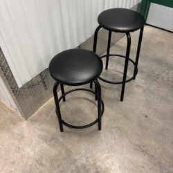 Two metal stools, 20 inch high and 24 inch high $30 for both
