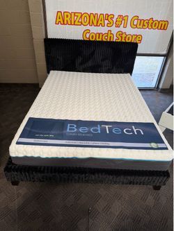 Black upholstered platform bed frame