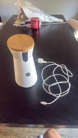 Furbo Dog Camera and treat dispenser.