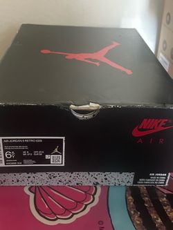 This is a Nike Air Jordan 5 Retro (GS) shoe box in white, black, and red