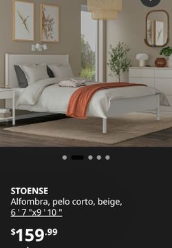 STOENSE Rug, short pile, beige, 6' 7" x 9' 10". Designer Maja Ganszyniec. Made from synthetic polypropylene fibers, making it highly stain-resistant a