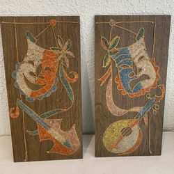 A Pair Of 60’s Gravel Art  Mid Century Drama Comedy Mask 8”x16”  This is a piece art , hand made ,vintage , very fine gravel  mask with musical instru
