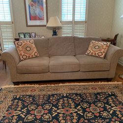 Very comfortable  couch/ sofa soft tan/green color mutted