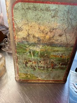 This is an antique or vintage Thomas J. Lipton Tea Planter Ceylon