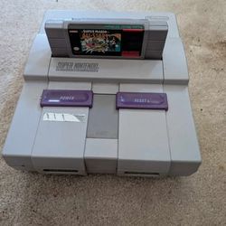 Super Nintendo with game