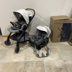 Nuna Mixx Stroller With Car Seat White Canopy