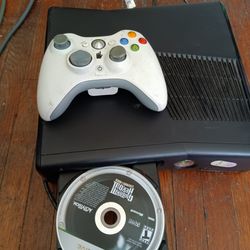 Xbox 360 slim with one controller two games