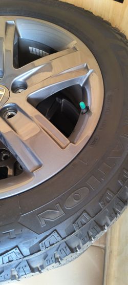 2017-2026 Honda Ridgeline/Pilot Wheels and tires mounted with tpm sensors and center caps.