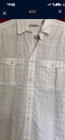 It’s very good shirt for man’s in size Large the color is white made by Burberry