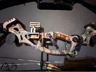 Bow and arrow .. 75th anniversary hoyt compound bow