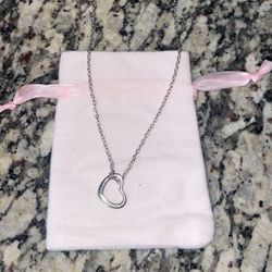 Heart shaped silver tone necklace