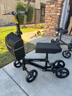 $60 - Black knee scooter, Brand New, easy to ride on indoor/outdoor. Better than crutches.