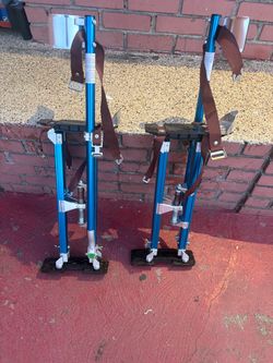 Drywall stilts adjustable. In good condition
