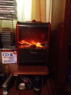 Comfort Zone: Small Flame Projection Heater.