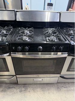 GE Stainless Steel 4 burner range stove