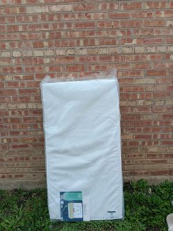 Serta New in plastic Crib  Matress