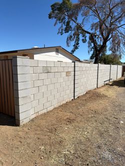Masonry fence block walls and stucco