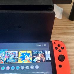 Nintendo swish oled complete... With games...