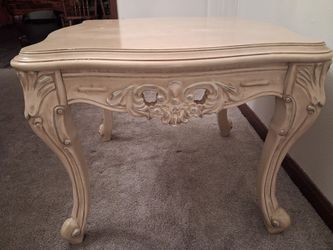 Beauty antique cream color wooden coffee table. With elaborate carved details and cabriole legs