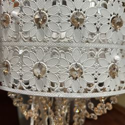 NEW JUST OUT OF THE BOX GORGEOUS LAMP WITH CRYSTALS HANGING FROM A WHITE DESIGNER HANGING LAMP 