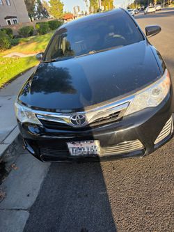 Toyota camry  black LE 2013.       187.000 mil