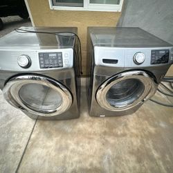 SAMSUNG GREY SELF CLEAN FRONT LOAD STEAM WASHER AND GAS DRYER SET 